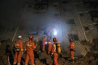 ss-151220-china-shenzhen-landslide-11_97bbe95b813cc9594c80b36e0e6f61f4.nbcnews-ux-1024-900.jpg