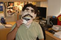 RS-10-03-07---gary-dell-abate-mask-eating-fake-black-and-white-cookie.jpg