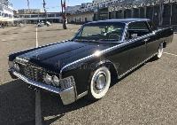 black-lincoln-continental-limousine-classic-car-seen-outside-black-lincoln-continental-limousine-classic-car-seen-145481390.jpg