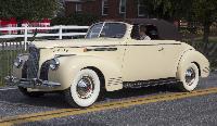 1941_Packard_One-Sixty_(Super_Eight)_Convertible_Coupe,_front_left_at_Hershey_2019.jpg